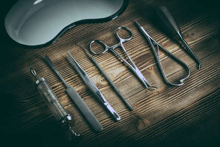 Old medicine equipment on wooden background. Vintage style.の写真素材