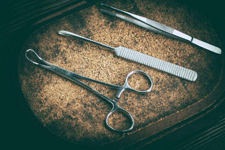 Old medicine equipment on wooden background. Vintage style.の写真素材