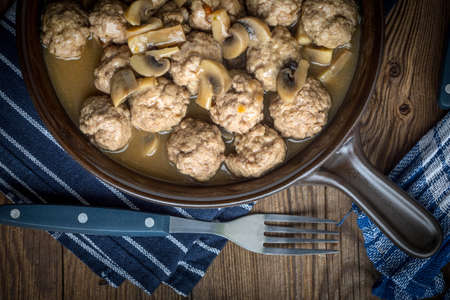 Delicious homemade swedish meatballs with mushroom cream sauce. Small depth of field. Top view.の写真素材
