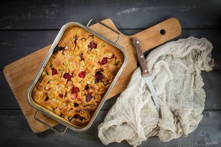 Freshly baked homemade pie with rhubarb and strawberry. top view;の写真素材