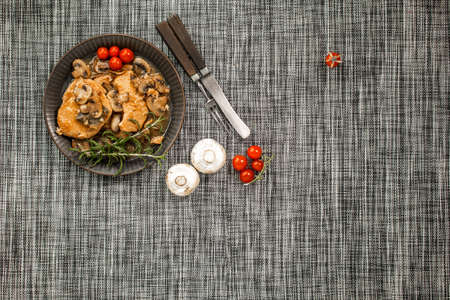 Stewed pork chop in a bright mushroom sauce. Top view.の写真素材