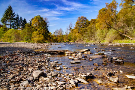 Above a mountain river on an autumn morning. Eastern Carpathians, Poland.の写真素材