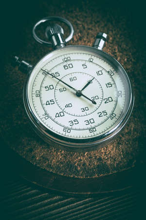 An old stopwatch on a cork background. Vintage style.の写真素材