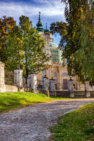 KLIMONTOW, POLAND - OCTOBER 9, 2015: Collegiate church of Saint Joseph in Klimontow village in Swietokrzyskie Voivodeship.のeditorial素材