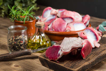 Raw uncooked turkey gizzards. Shallow depth of field.