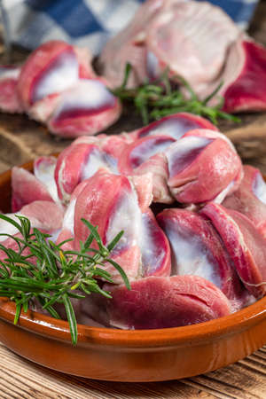 Raw uncooked turkey gizzards. Shallow depth of field.