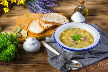 Polish barley soup with vegetables and chicken heart - krupnik.の写真素材