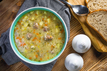 Polish barley soup with vegetables and chicken heart - krupnik.の写真素材