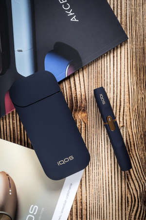 KATOWICE, POLAND - February 26, 2020: Heating tobacco system IQOS. IQOS Philip Morris tobacco product technologies.のeditorial素材