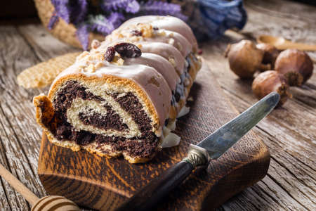 Delicious poppy seed strudel with icing.