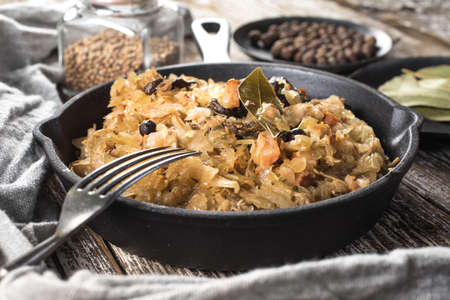 Bigos, a traditional Polish dish of sauerkraut served in a cast iron skillet.の写真素材