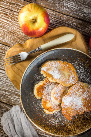 Sweet pancakes made of apple, milk and flour. Top view.の写真素材