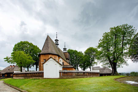 BLIZNE, POLAND - MAY 30, 2020: All Saints' church located in the village of Blizne, built before 1470. Inscribed on the UNESCO World Heritage List.のeditorial素材