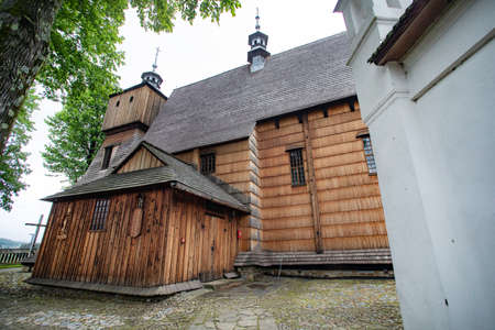 BLIZNE, POLAND - MAY 30, 2020: All Saints' church located in the village of Blizne, built before 1470. Inscribed on the UNESCO World Heritage List.のeditorial素材