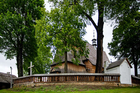 BLIZNE, POLAND - MAY 30, 2020: All Saints' church located in the village of Blizne, built before 1470. Inscribed on the UNESCO World Heritage List.のeditorial素材