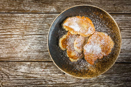 Sweet pancakes made of apple, milk and flour. Top view.の写真素材