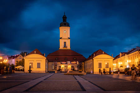 BIALYSTOK, POLAND - JULY 31, 2019: Kosciusko Main Square with Town Hall in Bialystok at night, Poland.のeditorial素材