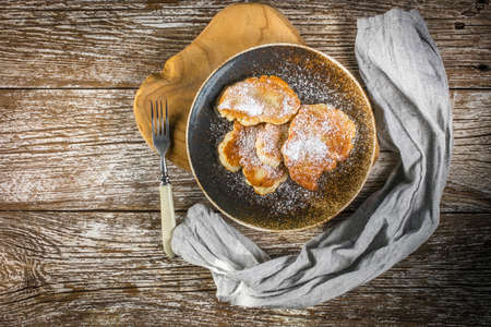 Sweet pancakes made of apple, milk and flour. Top view.の写真素材