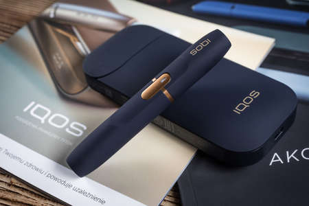 KATOWICE, POLAND - February 26, 2020: Heating tobacco system IQOS. IQOS Philip Morris tobacco...