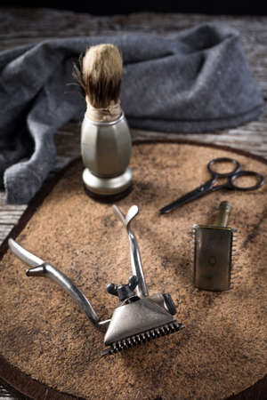 Vintage shaving and hair cutting tools. Selective focus.の写真素材