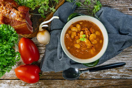 Baked beans in tomato sauce served in bowls.の写真素材