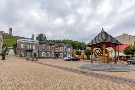 CHECINY, POLAND - SEPTEMBER 06, 2020: Historic well on the market of the old town.