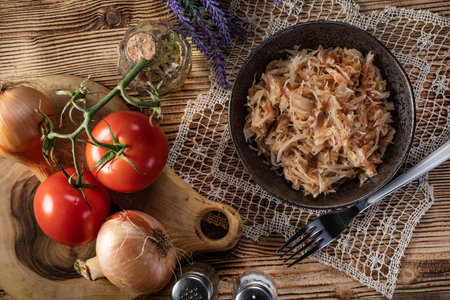 Stewed cabbage with onion and tomato is one of the most popular dish.の写真素材