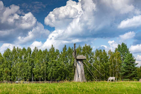 WASILKOW, POLAND - AUGUST 09.2019: Podlasie Museum of Folk Culture. Wooden windmill.のeditorial素材