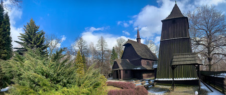 KATOWICE, POLAND - MARCH 08, 2021: Historical, 16th century wooden church St. Michael the archangel in Kosciuszko Park.の写真素材