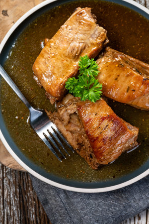Braised pork spare ribs served on a plate.の写真素材