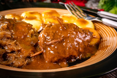 Beef roulade served with silesian noodles and fried cabbage.の写真素材