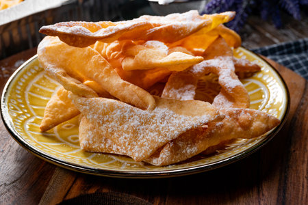Faworki (angel wings) sprinkled with powdered sugar - traditional Polish carnival delicacyの写真素材