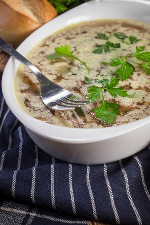 Homemade jelly meat on wooden table. Selective focus.の写真素材