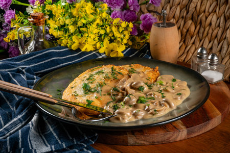 Crispy potato pancakes with mushroom sauce on wooden table.の写真素材