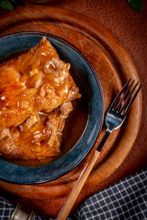 Braised pork ribs with spicy sauce in a bowl. Shallow depth of field.