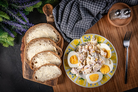 Boiled egg with ham, corn and mayonnaise salad.の写真素材