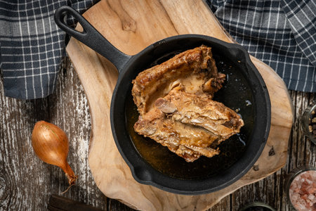 Braised ribs in a cast iron pan.の写真素材