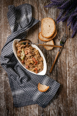 Bigos - sauerkraut stewed with meat, dried mushrooms and sausage. Traditional dish of Polish cuisine.の写真素材