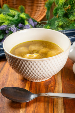 Delicious Russian pelmeni filled with meat traditionally served in broth.の写真素材