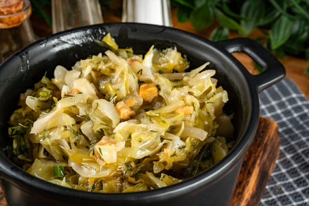 Stewed cabbage with onion and greaves is one of the most popular dish.の写真素材