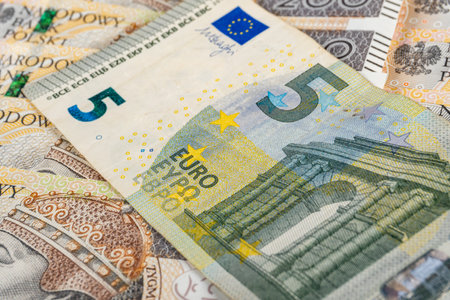 Euro banknote against the background of Polish currency.