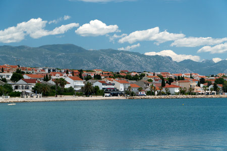 Town of Novalja waterfront and turquoise sea panoramic view.