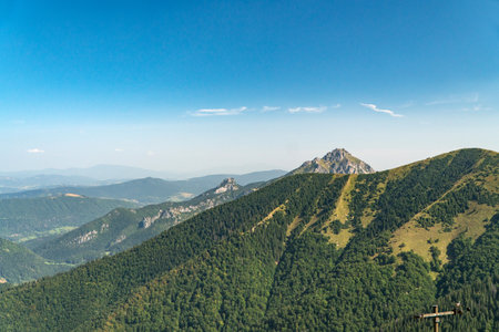 Hiking trail overlooking the mountain peaks of the hills.の写真素材