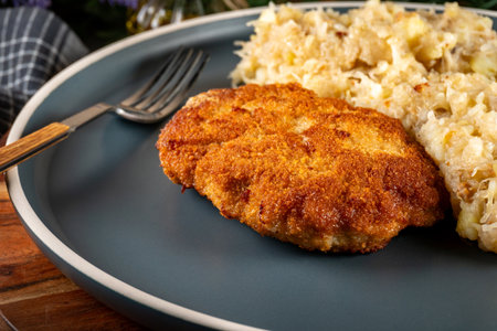 Minced meat cutlet with boiled cabbage and potatoes. Shallow depth of field.の写真素材