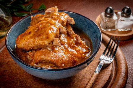 Braised pork ribs with spicy sauce in a bowl. Shallow depth of field.の写真素材