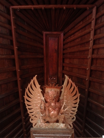 the Garuda bird post support on ceremonial pavilion in the Balinese compound の素材