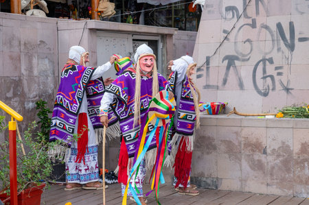 Traditional masked dancers perform the Danza de los Viejitos during Dia de Muertos in Janitzio, blending Michoacans indigenous heritage with colorful celebrationの写真素材