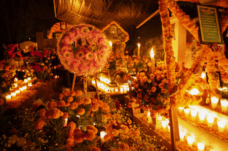 Day of the Dead altar with marigold flowers and candles in Tzintzuntzan cemeteryの写真素材