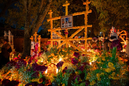 Day of the Dead altar with marigold flowers and candles in Tzintzuntzan cemeteryの写真素材