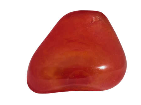 small carnelian stone isolated on whiteの写真素材